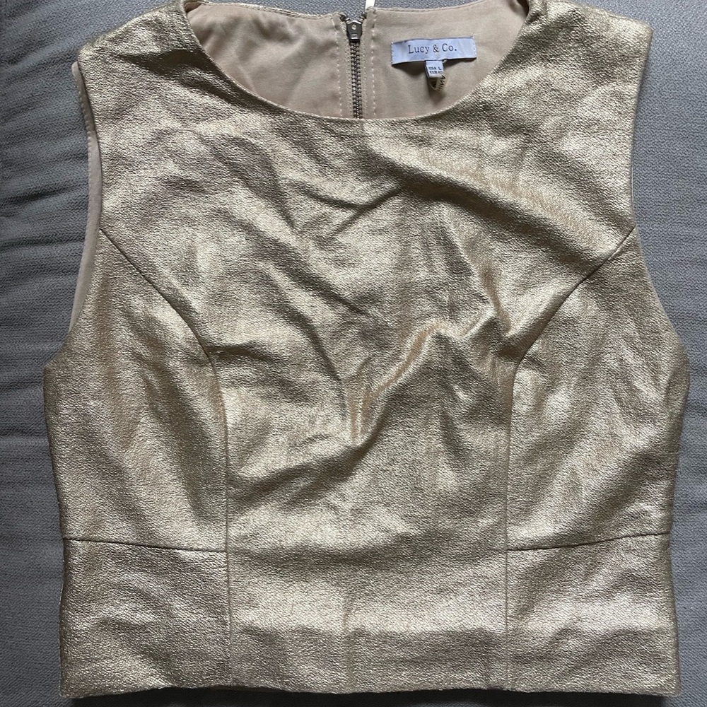 Gold top with cute zipper back - great for going out/special occasions!